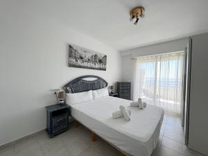 Postel nebo postele na pokoji v ubytování Apolo 16 Calpe + 10 fotografií