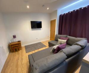 Ruang duduk di White Cottage - Cosy Holiday Cottage in Drymen, Loch Lomond & Trossachs