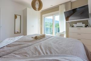Un pat sau paturi într-o cameră la Villa Saric