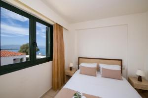 Postel nebo postele na pokoji v ubytování Margarita Beach Hotel + 37 fotografií