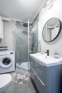 Ένα μπάνιο στο Apartament Alga1