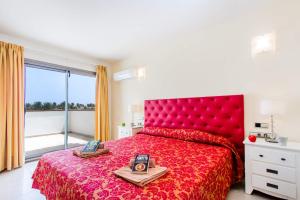 Łóżko lub łóżka w pokoju w obiekcie Villa Jenny by Villa Plus