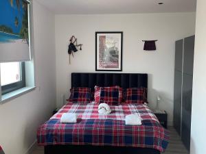 Ένα ή περισσότερα κρεβάτια σε δωμάτιο στο Scottish Thistle +36 φωτογραφίες