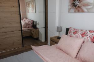 Postel nebo postele na pokoji v ubytování Apartman Mila 21