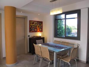 A seating area at Villa Le Lanterne Pool & Relax