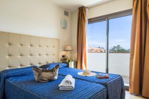 A bed or beds in a room at Villa Sirena by Villa Plus Még 11 kép