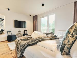 Ένα ή περισσότερα κρεβάτια σε δωμάτιο στο Hotel Auszeit