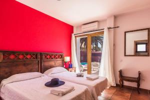 A bed or beds in a room at Villa Silvia II by Villa Plus