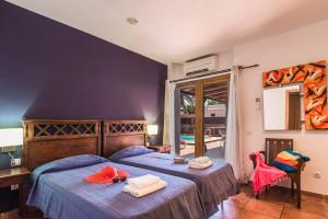 A bed or beds in a room at Villa Silvia II by Villa Plus