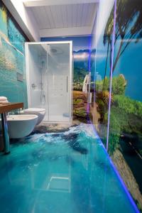 a bathroom with a swimming pool in the middle at Apartment Vesuvius in SantʼAntonio Abate