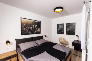 Postel nebo postele na pokoji v ubytování Apartmán 21 Hubertus