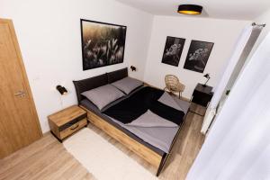 Postel nebo postele na pokoji v ubytování Apartmán 21 Hubertus