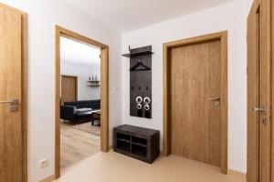 Postel nebo postele na pokoji v ubytování Apartmán 21 Hubertus