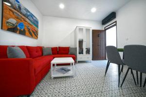 Posezení v ubytování CASA VERDE Comfortable Air-Conditioned Modern Apartments