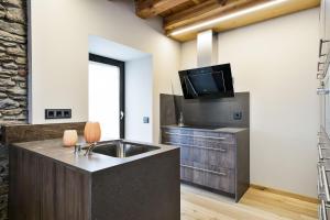 A kitchen or kitchenette at Luderna - Casa Les er Haro
