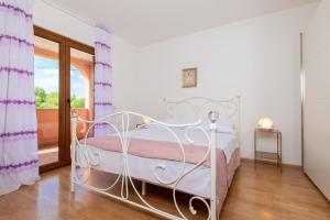 Ένα ή περισσότερα κρεβάτια σε δωμάτιο στο Villa 1574 +28 φωτογραφίες