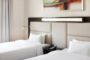 Uma cama ou camas num quarto em Holiday Inn Express Dubai Internet City by IHG