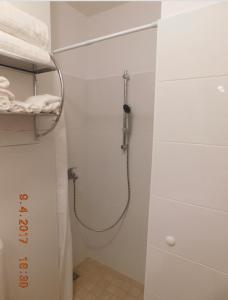 Koupelna v ubytování Apartmani ljuta naranča + 28 fotografií