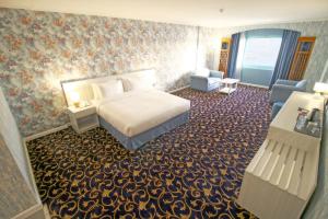 The George Hotel by Saffron, Dubai Creek客房内的一张或多张床位