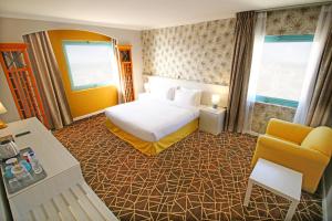 The George Hotel by Saffron, Dubai Creek客房内的一张或多张床位