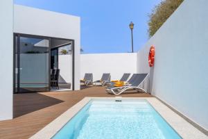 The swimming pool at or close to Villa JJ Beach by Villa Plus