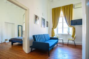 Posedenie v ubytovaní LE MURA OLD TOWN APARTMENT by DuHomes
