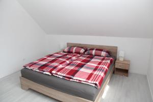 Postel nebo postele na pokoji v ubytování Haus Deichterrasse