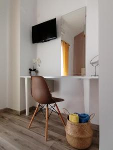 TV a/nebo společenská místnost v ubytování Christina Apartments