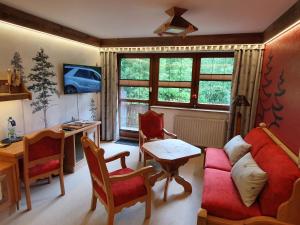 TV a/nebo společenská místnost v ubytování Hotel und Restaurant Köhlerhütte - Fürstenbrunn