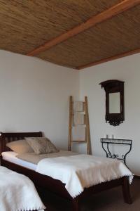 מיטה או מיטות בחדר ב-Störtebeker Hof Pension