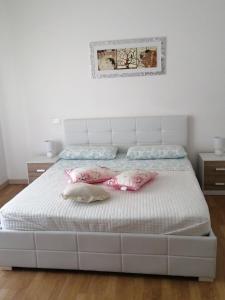 Postel nebo postele na pokoji v ubytování Due Magnolie
