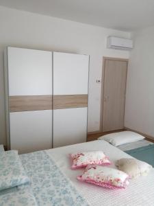 Postel nebo postele na pokoji v ubytování Due Magnolie