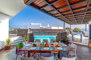 A balcony or terrace at Villa Inma Calero by Villa Plus