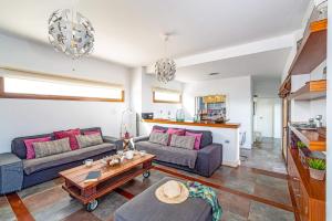A seating area at Villa Inma Calero by Villa Plus