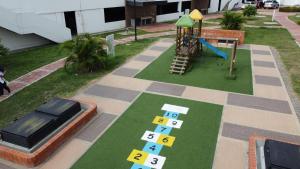 Детская игровая зона в Apartamento Aqualina Orange Segundo Piso Vista a Piscina