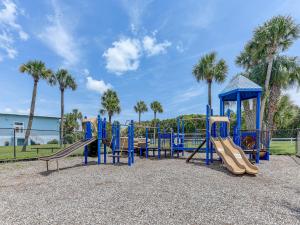 a playground with a slide at Wave Runner, 4 Bedrooms, Sleeps 10, Ocean Front, WiFi in Flagler Beach