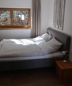 Postel nebo postele na pokoji v ubytování Geelink's Berghütte