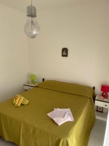 Ein Bett oder Betten in einem Zimmer der Unterkunft Casa Vacanza Mauricio