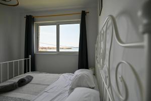 Postel nebo postele na pokoji v ubytování Apartmani Frleta