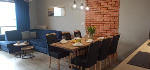Część wypoczynkowa w obiekcie Apartament z basenem i klimatyzacją