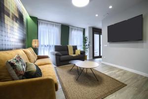 A television and/or entertainment centre at Apto rural Alesves Esencia de Bardenas Navarra