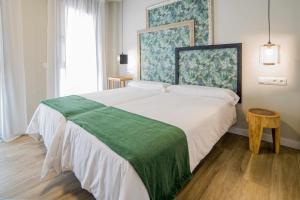 A bed or beds in a room at Apto rural Alesves Esencia de Bardenas Navarra