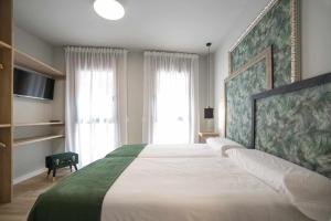 A bed or beds in a room at Apto rural Alesves Esencia de Bardenas Navarra