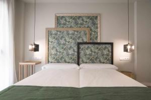 A bed or beds in a room at Apto rural Alesves Esencia de Bardenas Navarra