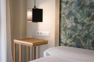 A bed or beds in a room at Apto rural Alesves Esencia de Bardenas Navarra