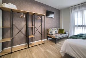 A bed or beds in a room at Apto rural Alesves Esencia de Bardenas Navarra