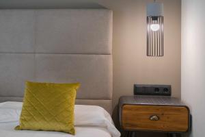 A bed or beds in a room at Apto rural Alesves Esencia de Bardenas Navarra