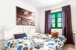 Postel nebo postele na pokoji v ubytování Villa Oro by Villa Plus