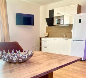 Kuchyň nebo kuchyňský kout v ubytování WX Hotel