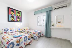 Postel nebo postele na pokoji v ubytování Villa Princesa Ico by Villa Plus + 14 fotografií